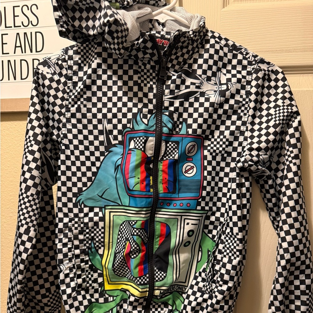 Warner Bros. Black and White Checkered Raincoat with Graphic Design